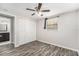 Well-lit bedroom, wood-look floors, and a ceiling fan at 3612 Phillips St, Tampa, FL 33619