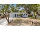 Quaint light blue house with a spacious yard at 3612 Phillips St, Tampa, FL 33619