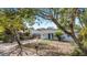 Cute ranch home with a fenced yard and mature trees at 3612 Phillips St, Tampa, FL 33619