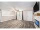 Bright living room with fireplace and hardwood floors at 3612 Phillips St, Tampa, FL 33619