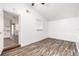 Bright spare bedroom with wood-look floors and an open concept at 3612 Phillips St, Tampa, FL 33619