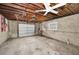 Unfinished garage with overhead door, needs renovation at 366 La Hacienda Dr, Indian Rocks Beach, FL 33785