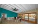 Under renovation: Kitchen boasts water views and a teal accent wall at 366 La Hacienda Dr, Indian Rocks Beach, FL 33785