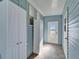 Covered back porch with storage and exterior access at 37622 New Horizons Blvd, Zephyrhills, FL 33541