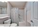 Bathroom featuring a shower/tub, granite countertop and updated vanity at 37622 New Horizons Blvd, Zephyrhills, FL 33541