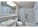 Clean bathroom with shower/tub combo, granite countertop, and updated vanity at 37622 New Horizons Blvd, Zephyrhills, FL 33541