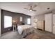 Bedroom with two windows, dresser, and a view at 37622 New Horizons Blvd, Zephyrhills, FL 33541