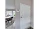 Interior view of entryway with security system and door at 37622 New Horizons Blvd, Zephyrhills, FL 33541