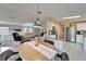 Open concept kitchen with breakfast bar and stainless steel appliances at 37622 New Horizons Blvd, Zephyrhills, FL 33541