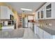 Modern kitchen with stainless steel appliances and granite countertops at 37622 New Horizons Blvd, Zephyrhills, FL 33541