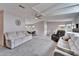 Open concept living room with ample natural light and comfortable furnishings at 37622 New Horizons Blvd, Zephyrhills, FL 33541