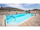 Relaxing community pool with ample deck space at 37622 New Horizons Blvd, Zephyrhills, FL 33541