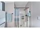 Walk-in shower with a seat and grab bar at 37622 New Horizons Blvd, Zephyrhills, FL 33541