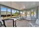 Sunroom with windows offering a view of the backyard at 37622 New Horizons Blvd, Zephyrhills, FL 33541