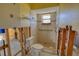 Bathroom with damaged walls and exposed plumbing requiring repair at 4024 Centavo Ct, Hernando Beach, FL 34607