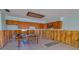 Damaged kitchen with exposed framing and flooring needing renovation at 4024 Centavo Ct, Hernando Beach, FL 34607