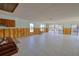 Large living area undergoing renovations with water views at 4024 Centavo Ct, Hernando Beach, FL 34607