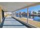 Enjoy waterfront views from this screened porch at 4024 Centavo Ct, Hernando Beach, FL 34607