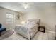 Cozy bedroom with neutral walls, decorative accents, and a plush bed at 4725 Christa Ct # 331, Tampa, FL 33614
