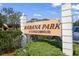 Welcoming 'Habana Park' community sign amidst lush greenery and trees under a clear blue sky at 4725 Christa Ct # 331, Tampa, FL 33614