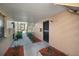 Private condo entrance with covered walkway and secure entry door at 4725 Christa Ct # 331, Tampa, FL 33614