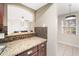 Kitchen counter opening with view into the living room area of the home at 4725 Christa Ct # 331, Tampa, FL 33614