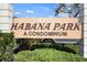 Community sign for Habana Park a Condominium, showing lush landscaping at 4725 Christa Ct # 331, Tampa, FL 33614