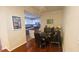 Bright dining area with a glass table and kitchen view at 501 Knights Run Ave # 2205, Tampa, FL 33602