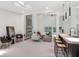 Open floor plan with modern kitchen, island, and breakfast bar at 513 Hand Ave, Sarasota, FL 34232