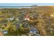 Modern home's aerial view showcasing neighborhood and waterfront at 730 W Alda Ne Way, St Petersburg, FL 33704