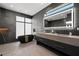 Luxurious bathroom with double vanity, soaking tub, and large mirror at 730 W Alda Ne Way, St Petersburg, FL 33704