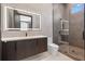 Contemporary bathroom with a floating vanity, walk in shower, and designer tile at 730 W Alda Ne Way, St Petersburg, FL 33704