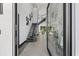 Bright and spacious entryway with modern staircase at 730 W Alda Ne Way, St Petersburg, FL 33704