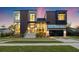Modern two-story home with dark wood and white exterior at 730 W Alda Ne Way, St Petersburg, FL 33704