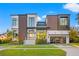 Luxury home showcasing clean lines and large windows at 730 W Alda Ne Way, St Petersburg, FL 33704
