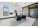 Elegant home office featuring modern desk, chairs, and built-in shelving at 730 W Alda Ne Way, St Petersburg, FL 33704