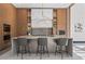 Modern kitchen with marble backsplash and wood cabinets at 730 W Alda Ne Way, St Petersburg, FL 33704