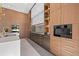 Modern kitchen with built-in appliances and custom cabinetry at 730 W Alda Ne Way, St Petersburg, FL 33704