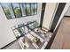 High-ceilinged living area with fireplace and access to patio at 730 W Alda Ne Way, St Petersburg, FL 33704