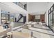 Open living space with sectional sofa, high ceilings and modern kitchen view at 730 W Alda Ne Way, St Petersburg, FL 33704