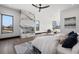 Luxurious bedroom with fireplace, sitting area, and large windows at 730 W Alda Ne Way, St Petersburg, FL 33704