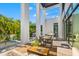 Modern patio furniture and a dining table alongside a refreshing pool at 730 W Alda Ne Way, St Petersburg, FL 33704