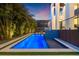 Night view of a modern pool and spa with lighting at 730 W Alda Ne Way, St Petersburg, FL 33704