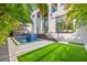Modern pool and spa with a grassy backyard at 730 W Alda Ne Way, St Petersburg, FL 33704