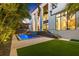 Night view of a modern pool and spa with lighting at 730 W Alda Ne Way, St Petersburg, FL 33704