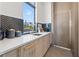 Contemporary wet bar with white countertops, gold accents, and chevron backsplash at 730 W Alda Ne Way, St Petersburg, FL 33704