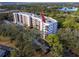 Aerial view of condo building showcasing its location and surrounding landscape at 8186 Terrace Garden N Dr # 609, St Petersburg, FL 33709