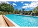 Inviting community pool with plenty of lounge chairs at 8186 Terrace Garden N Dr # 609, St Petersburg, FL 33709