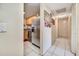 Hallway view with kitchen and a door to another room at 8348 Garrison Cir, Tampa, FL 33615