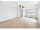 Spacious bedroom with hardwood floors and ceiling fan at 8719 92Nd Ter, Seminole, FL 33777